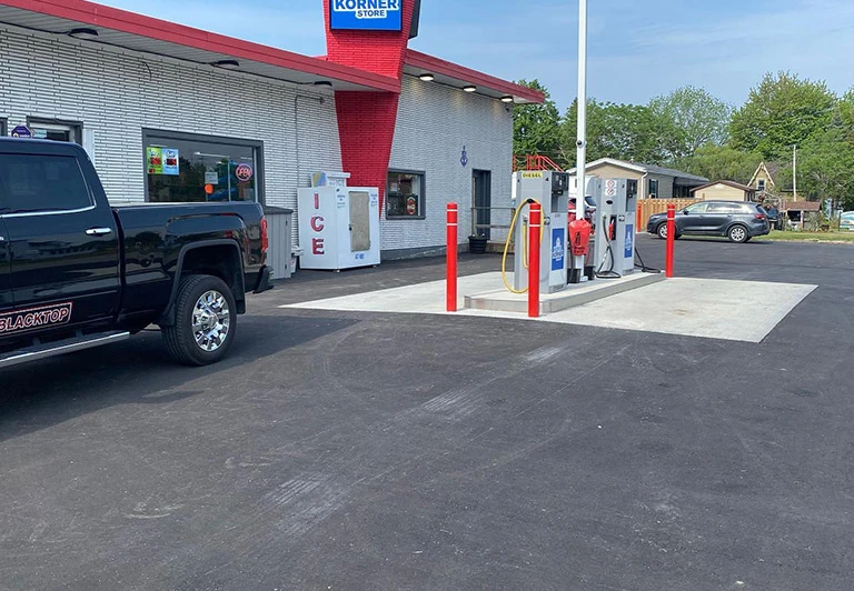 Peters Paving blacktop installation for a high-traffic gas station and convenience store parking lot.